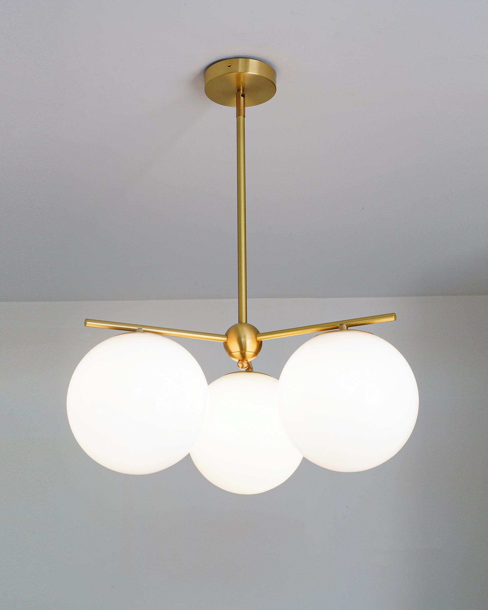 Modern Brass Chandelier with Glass Spheres