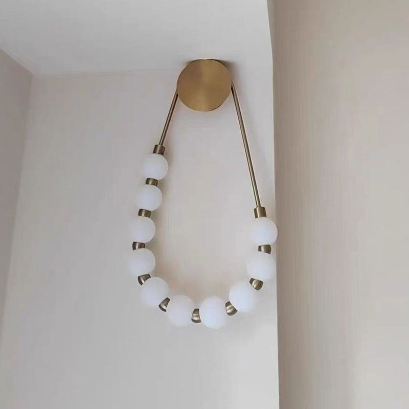 Minimalist Curvilinear LED-Integrated Wall Sconce