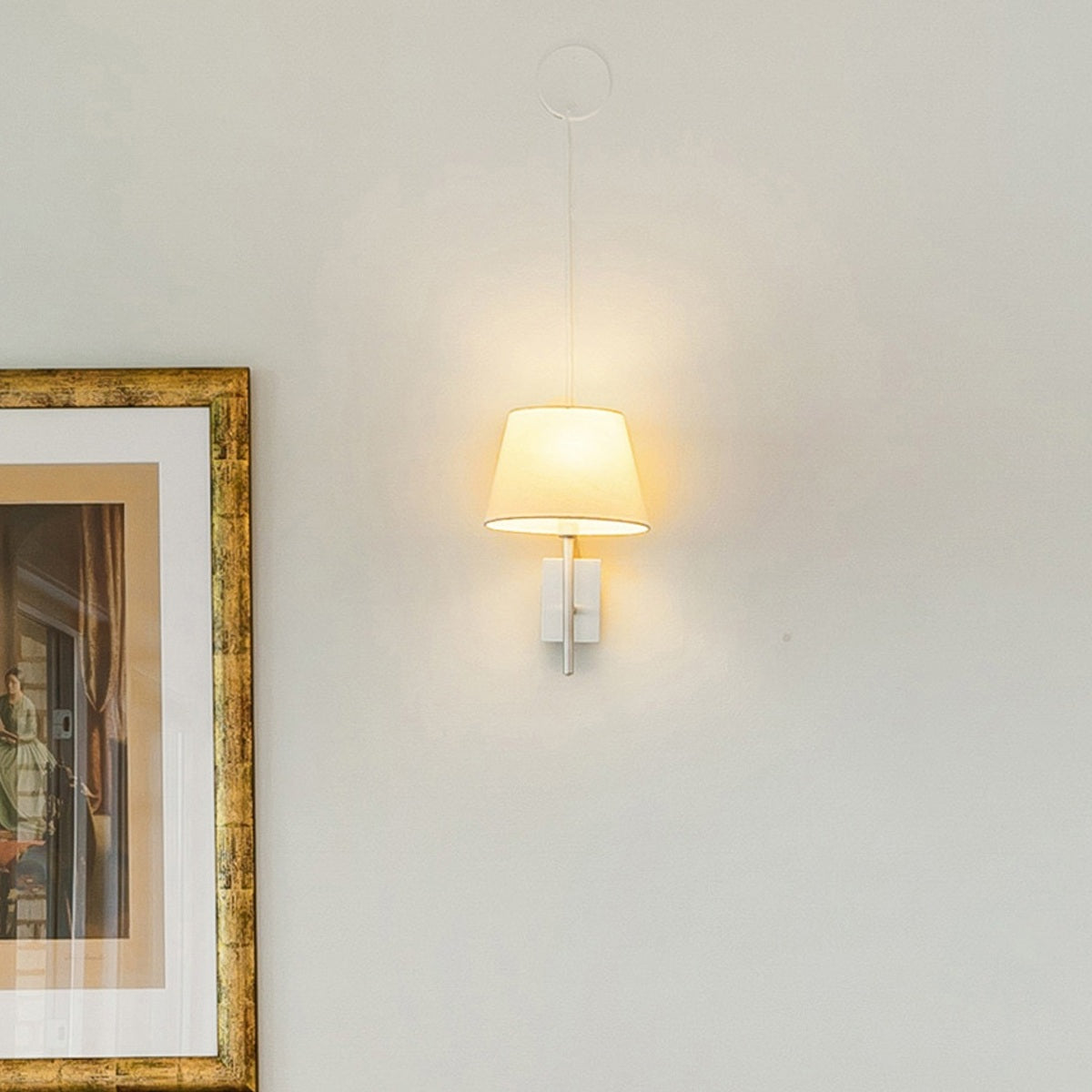 Minimalist indoor wall light creating a soft and cozy ambiance in a living space.