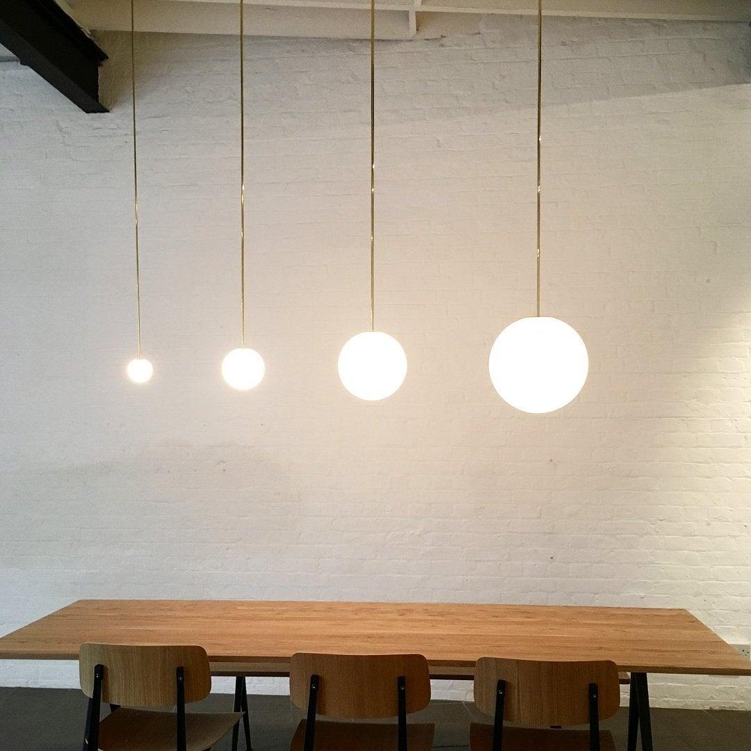 Brass Architectural Pendant Light - Modern Globe Design