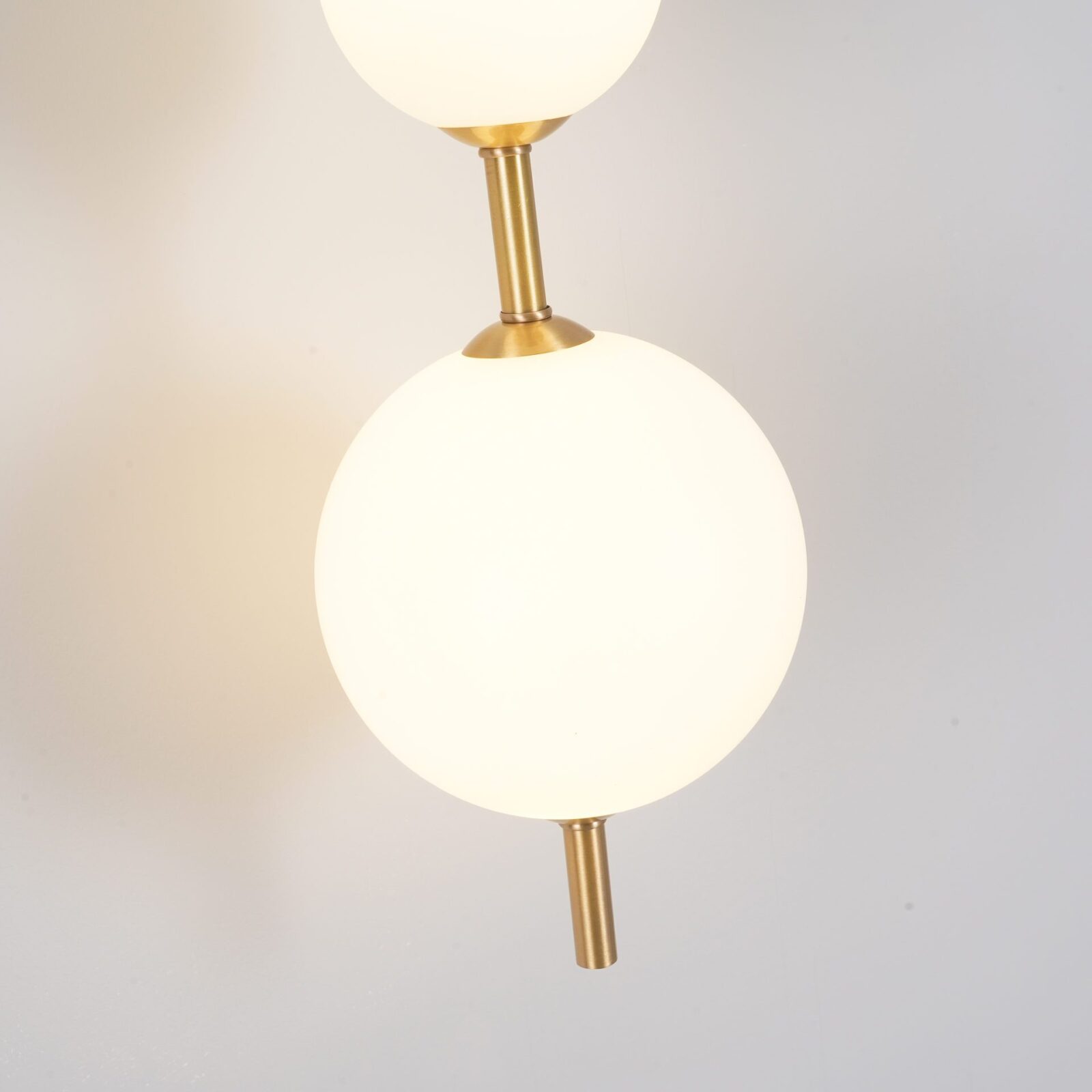 Contemporary Vertical Globe Wall Sconce – Matte White