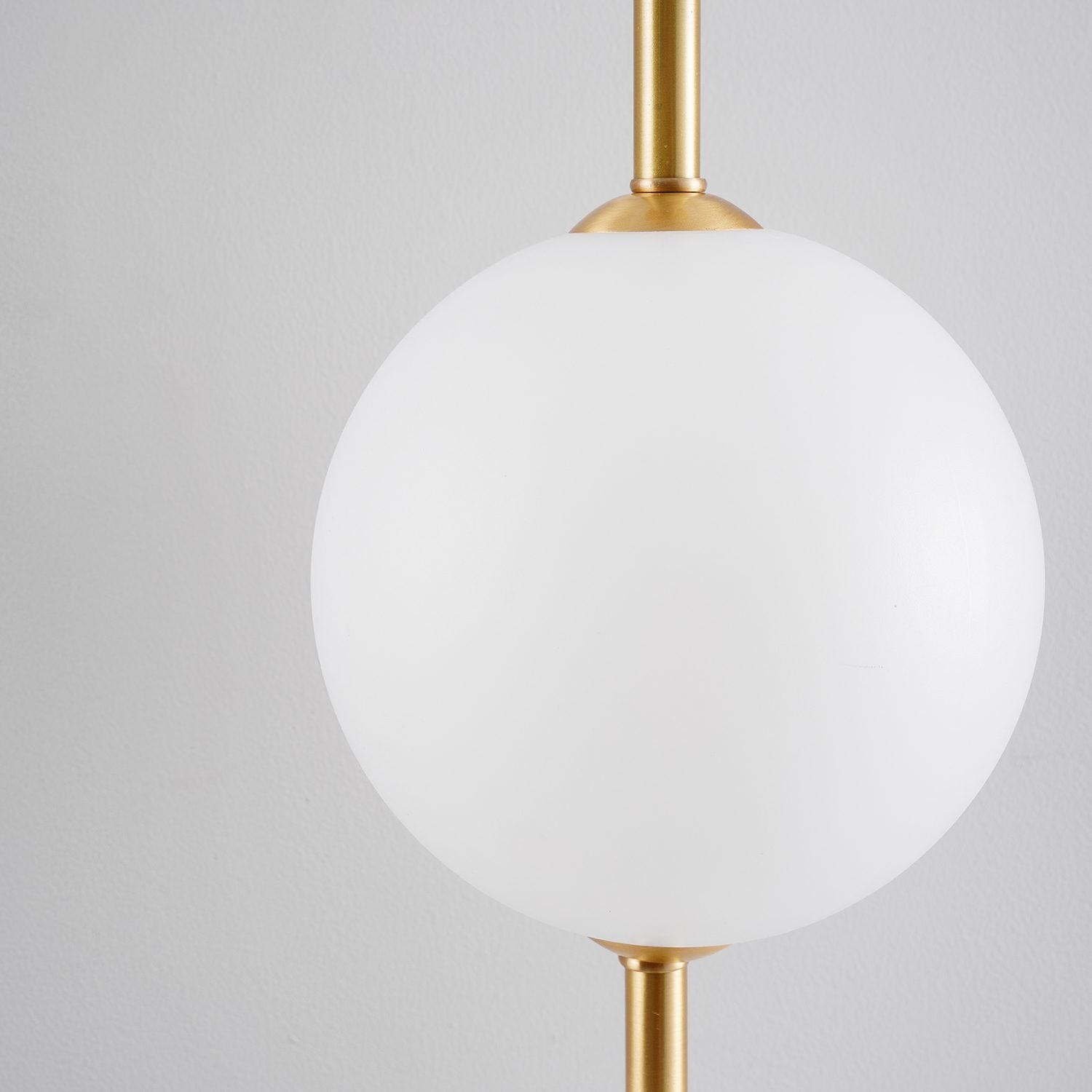 Contemporary Vertical Globe Wall Sconce – Matte White