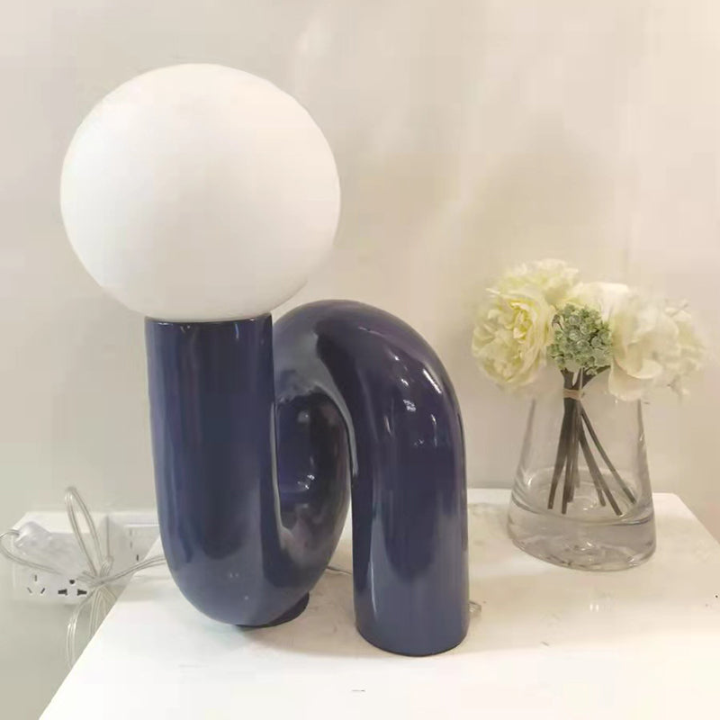 Contemporary Table Lamp with Voluminous N-Shaped Base