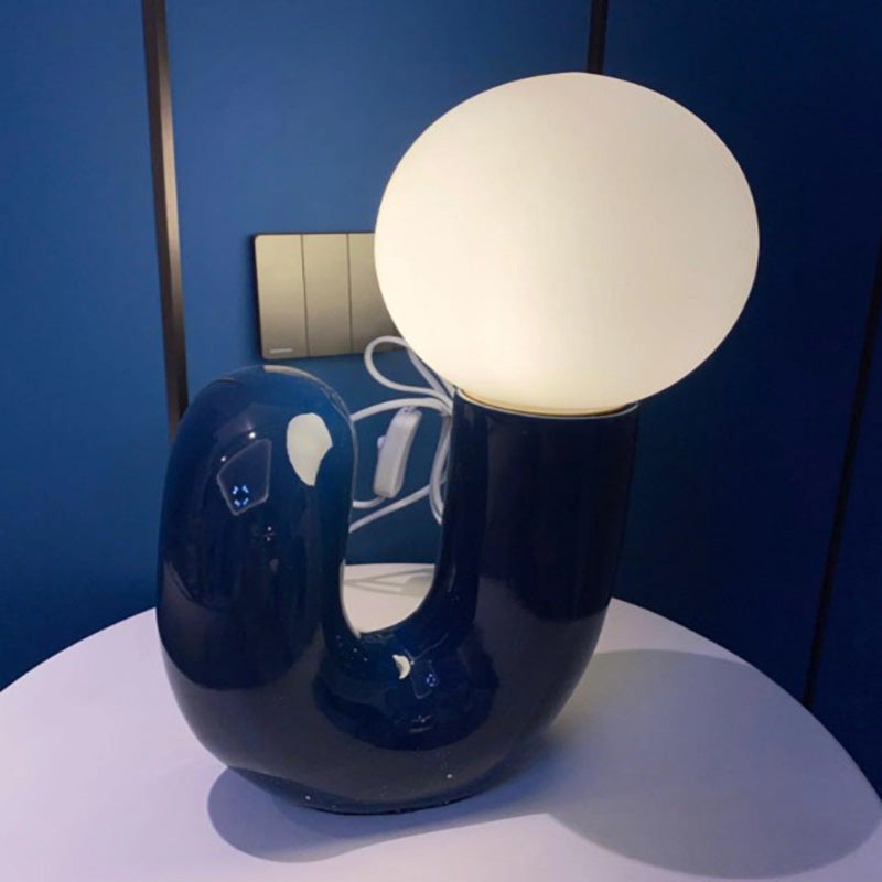 Contemporary Table Lamp with Voluminous N-Shaped Base