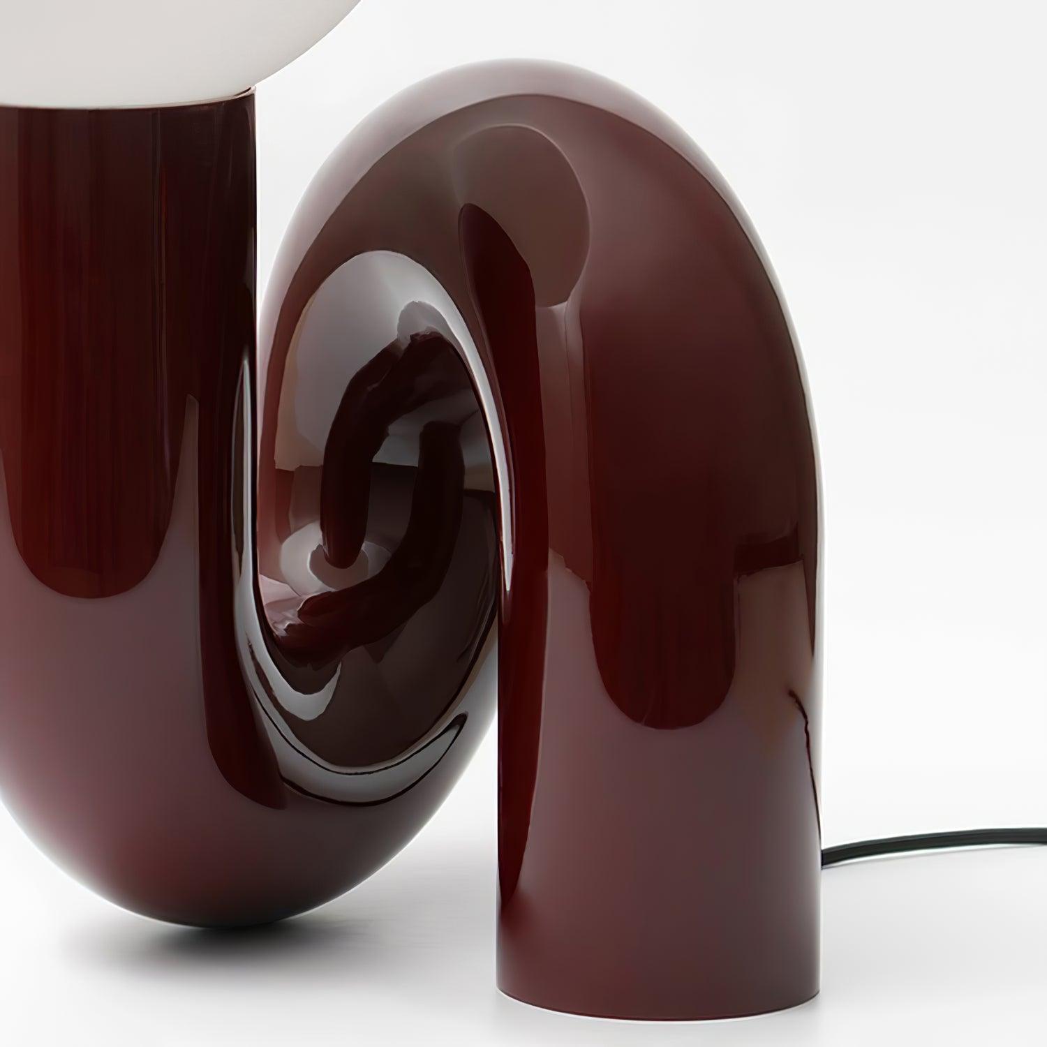 Contemporary Table Lamp with Voluminous N-Shaped Base