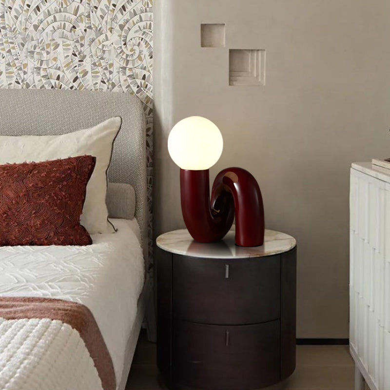 Contemporary Table Lamp with Voluminous N-Shaped Base