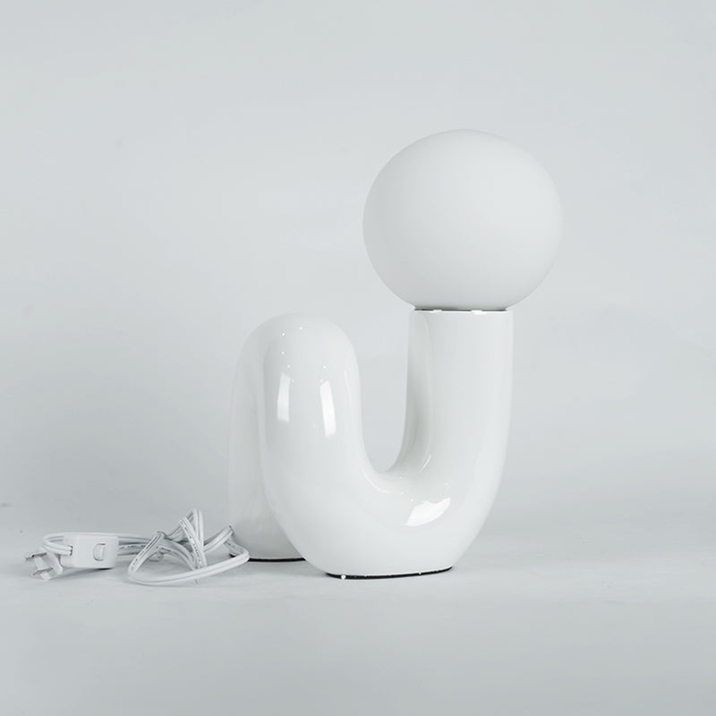 Contemporary Table Lamp with Voluminous N-Shaped Base