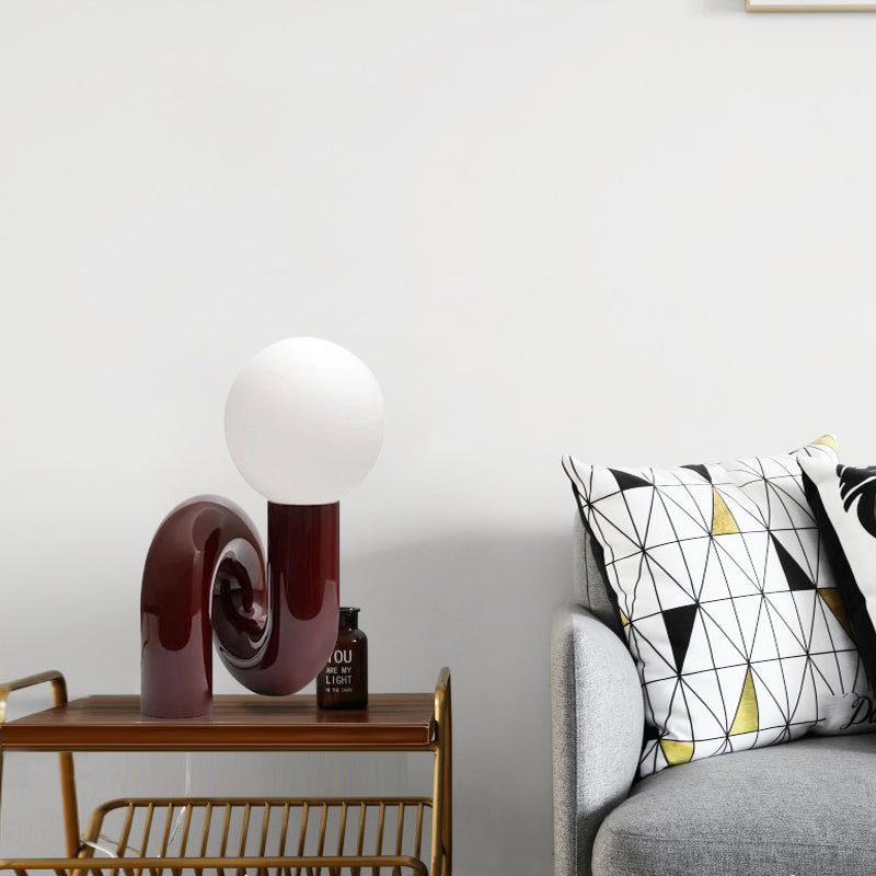 Contemporary Table Lamp with Voluminous N-Shaped Base