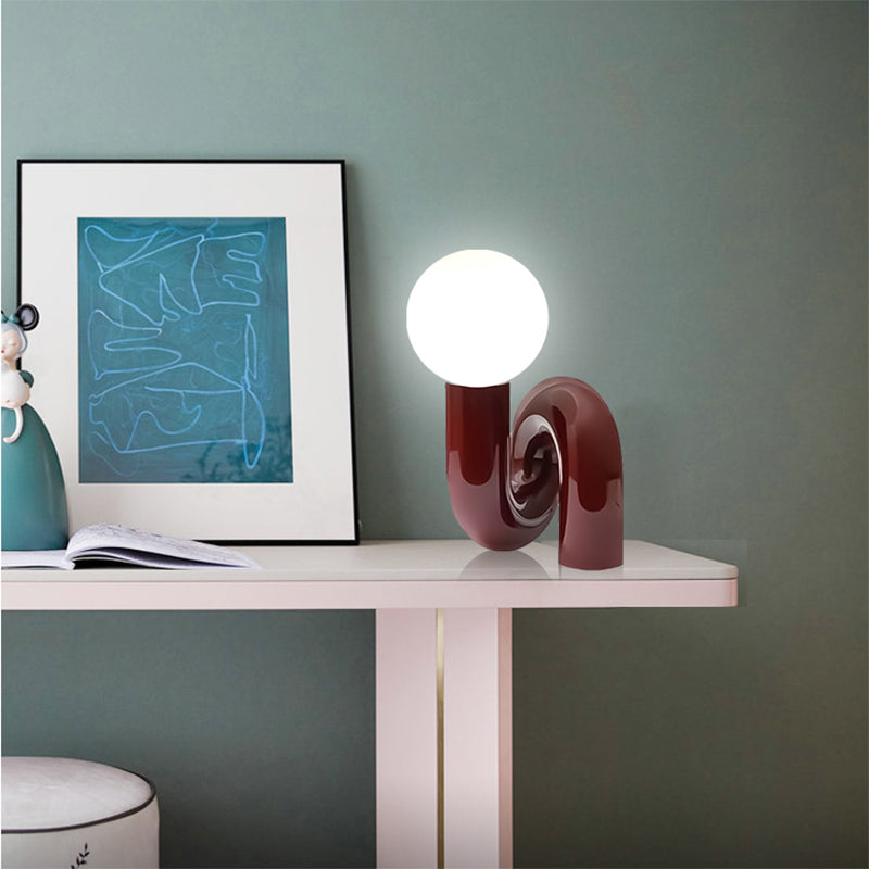 Contemporary Table Lamp with Voluminous N-Shaped Base