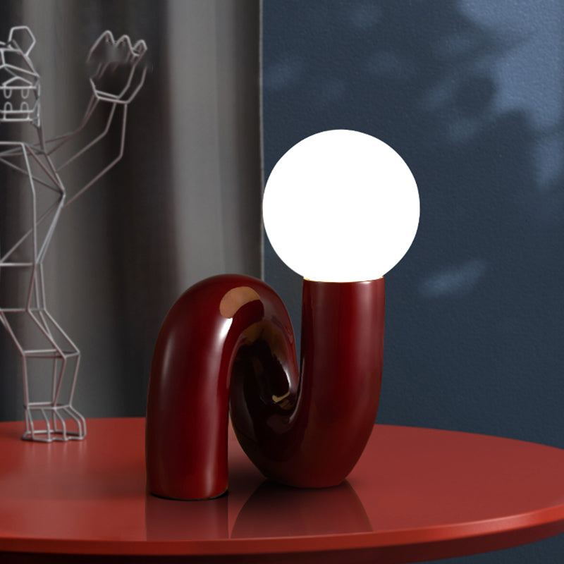 Contemporary Table Lamp with Voluminous N-Shaped Base