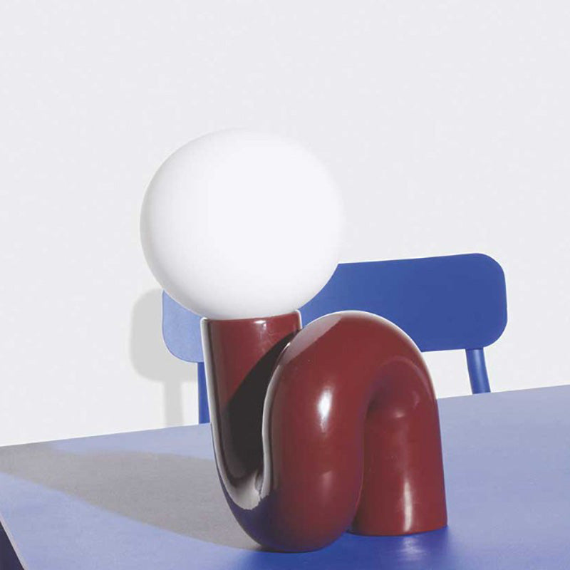 Contemporary Table Lamp with Voluminous N-Shaped Base