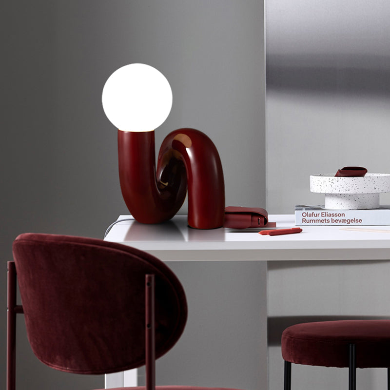 Contemporary Table Lamp with Voluminous N-Shaped Base