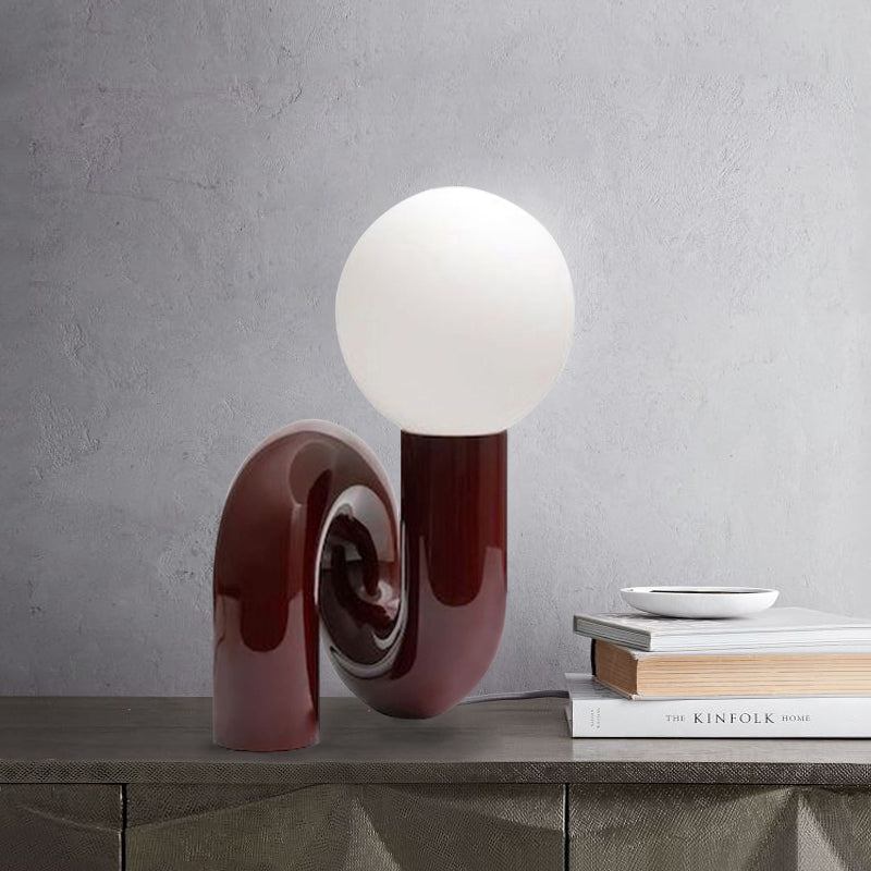 Contemporary Table Lamp with Voluminous N-Shaped Base