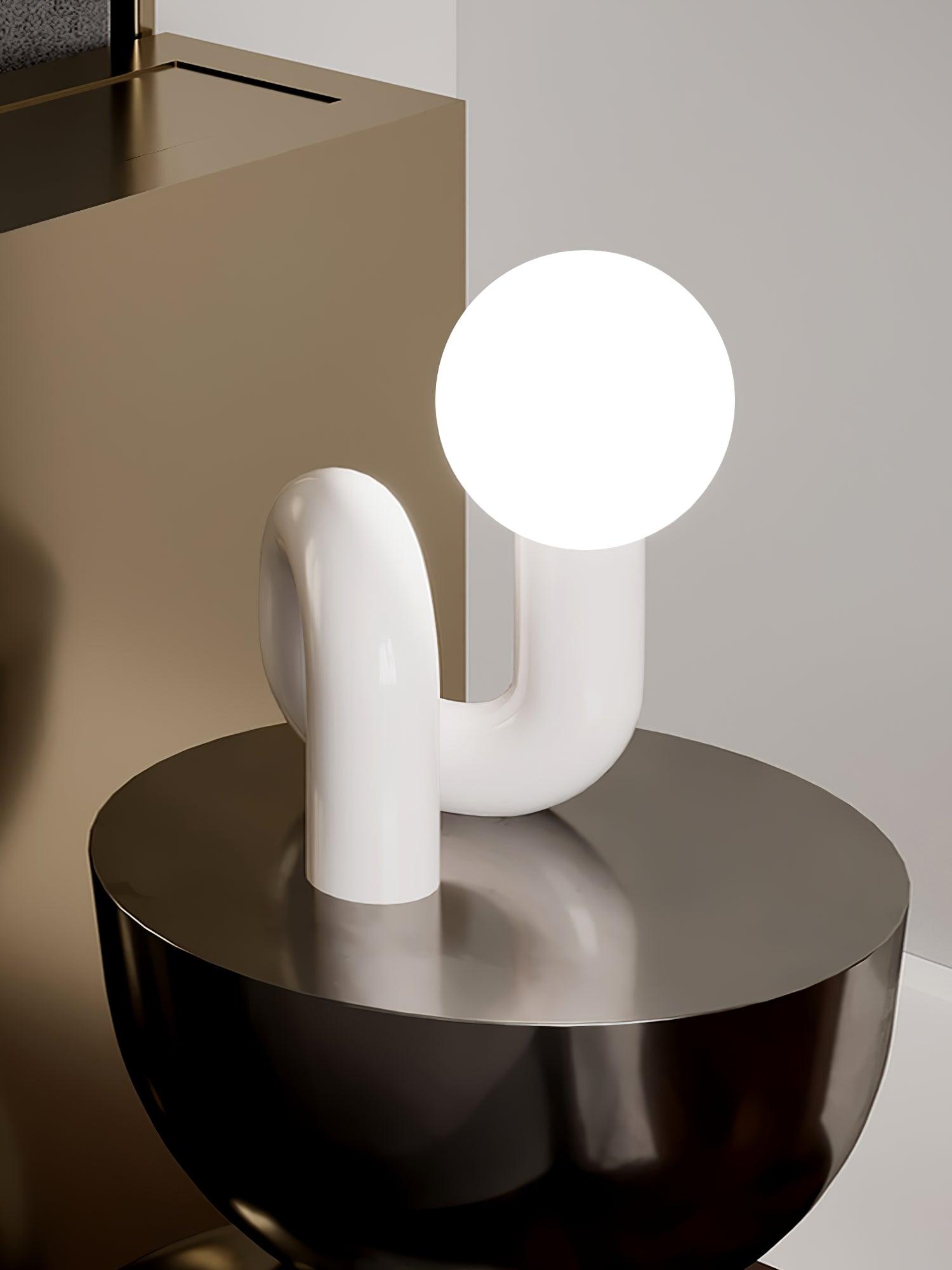 Contemporary Table Lamp with Voluminous N-Shaped Base