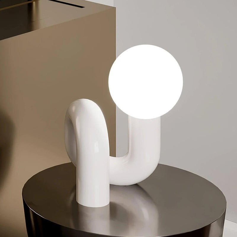 Contemporary Table Lamp with Voluminous N-Shaped Base