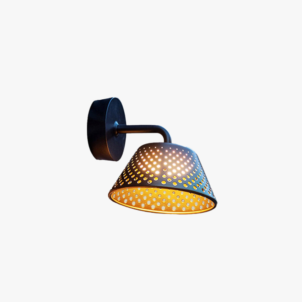 Industrial outdoor wall lamp with perforated metal design, waterproof and LED-compatible. Ideal for patios, gardens, and rustic outdoor lighting setups.

