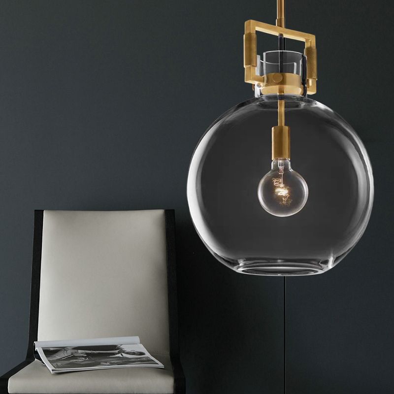 Minimalist Brass Pendant Light with Spherical Shade