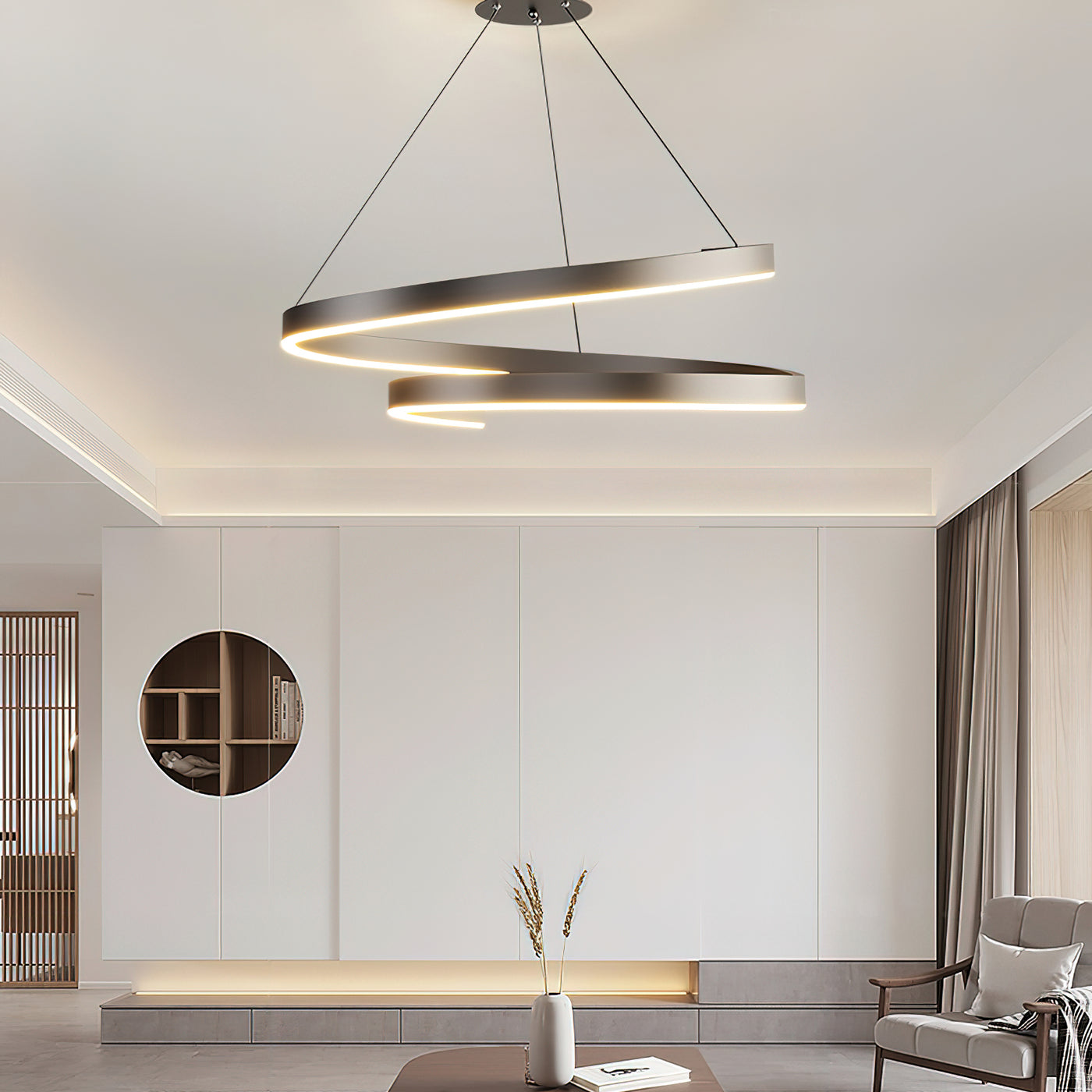 Black modern pendant light with adjustable dimmable LED rings in a living room