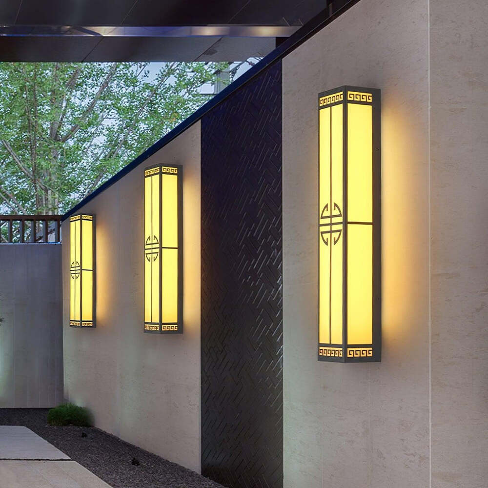 Modern Gold Outdoor Wall Light with Decorative Black Accents