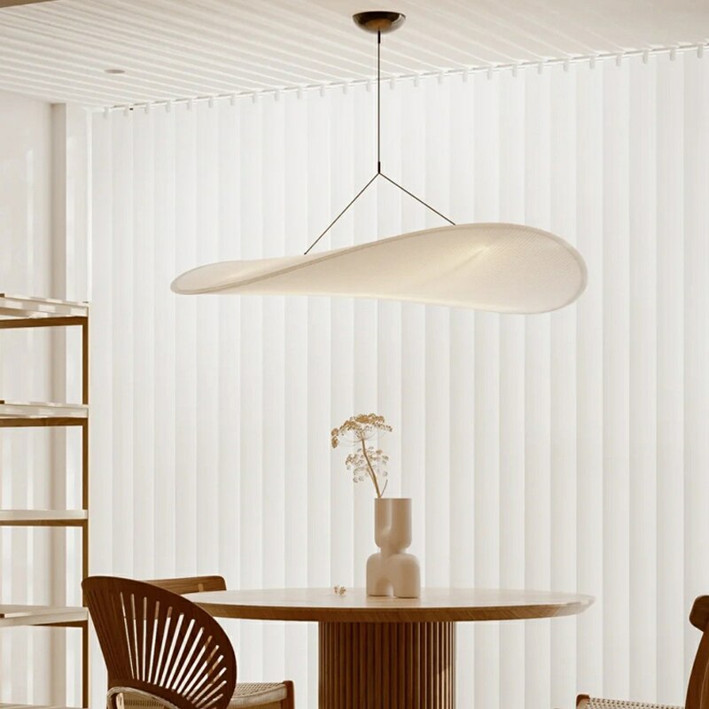 CloudGlo LED Pendant Light creating a serene ambiance over a dining table, enhancing the modern decor.