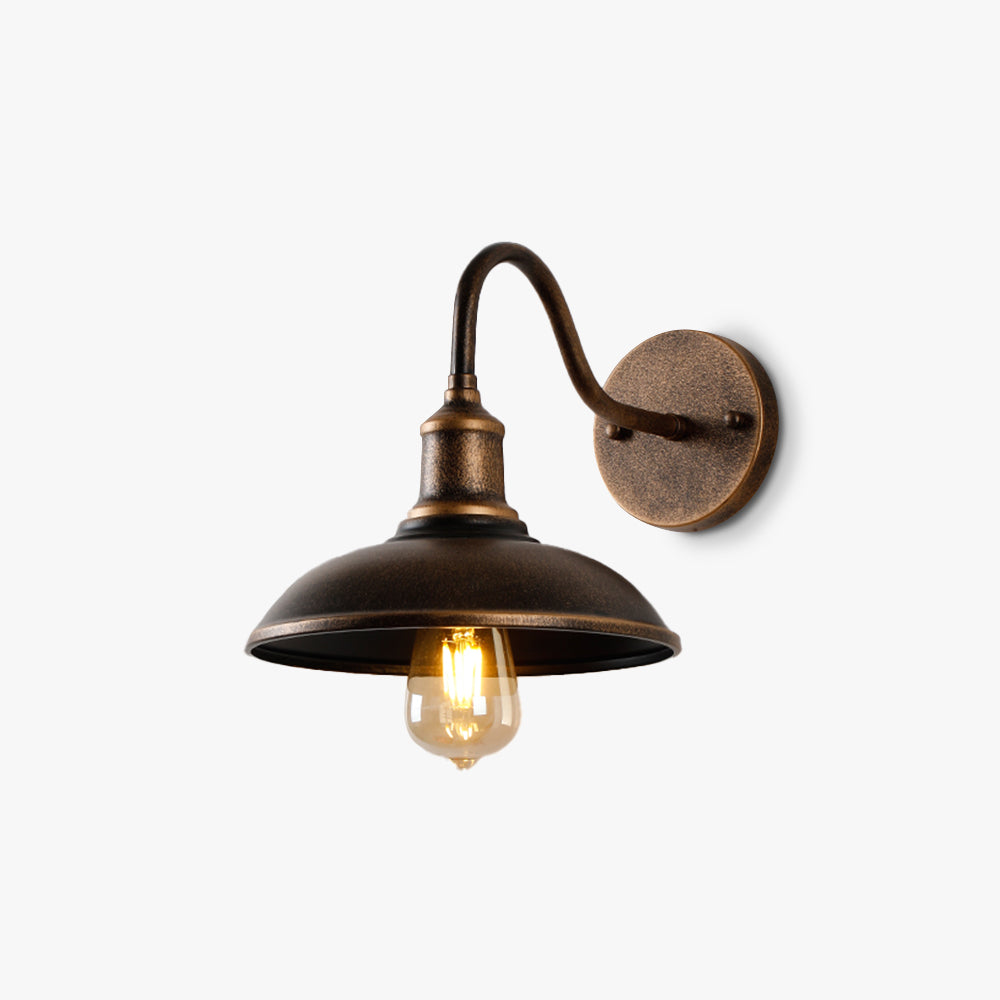 Rustic bowl-shaped outdoor wall lamp in antique brass, perfect for adding vintage charm to patios, courtyards, and terraces. Waterproof and durable.

