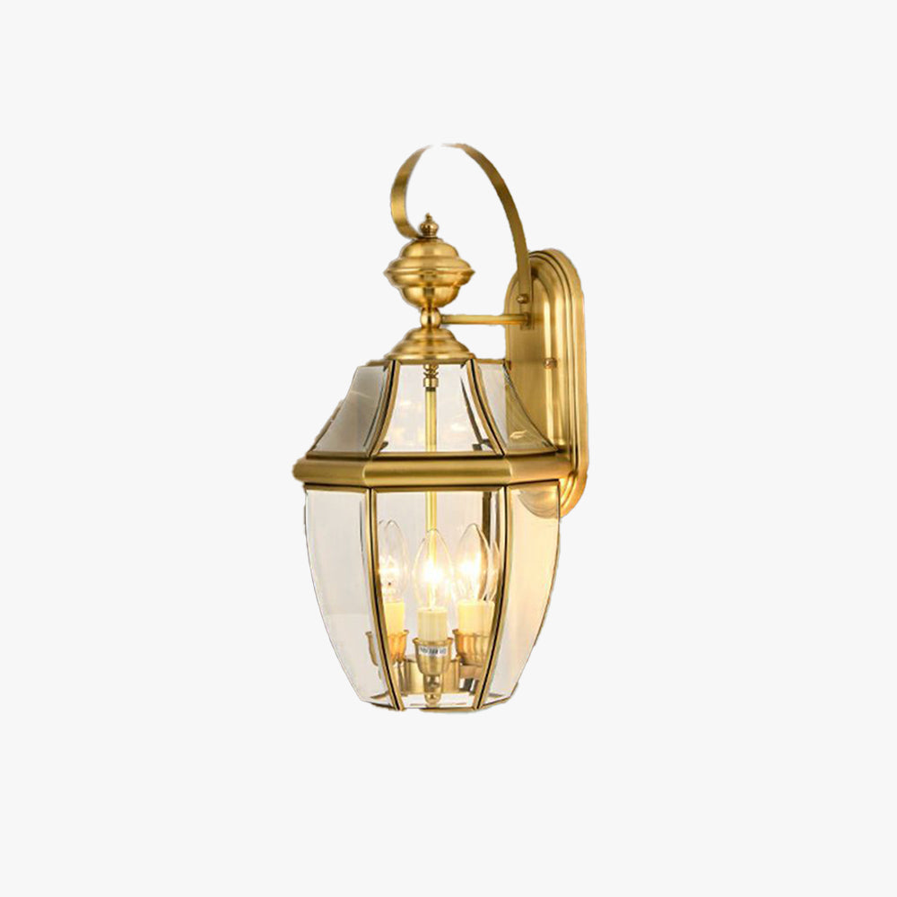 Vintage gold outdoor wall lantern made of metal and glass, ideal for courtyards, balconies, and patios. Luxurious lighting solution for outdoor spaces.

